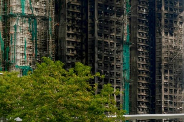 Hong Kong minister urges landlords to avoid cashing in on Tai Po fire rent aid