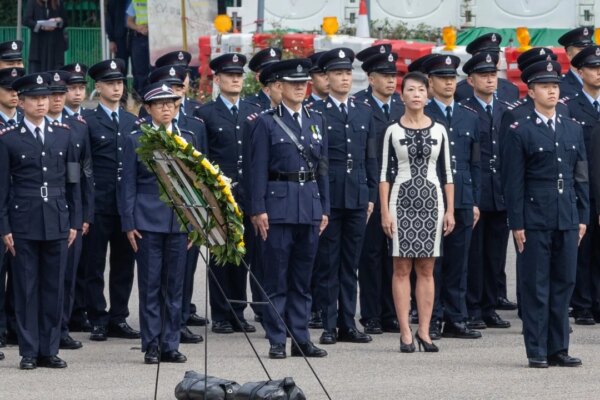Hong Kong district officer apologises over outfit choice at firefighter’s funeral