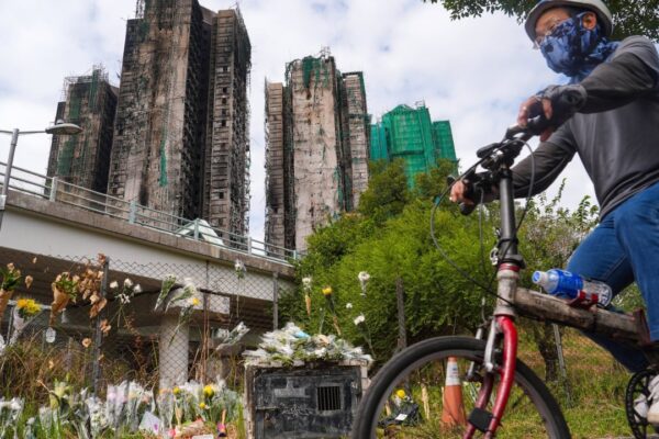 Residents of tower spared in Hong Kong blaze get 90 minutes to fetch belongings