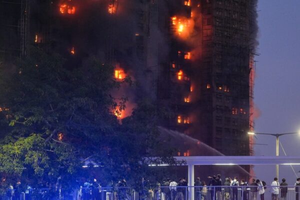 We want to stay in Hong Kong, say Filipino helpers who survived deadly blaze