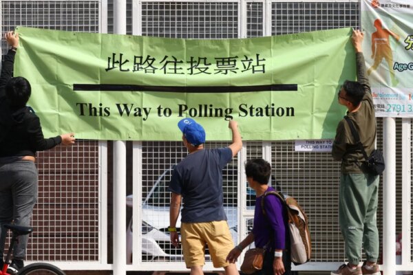 Last-ditch effort to get Hongkongers to vote in Legco poll, but turnout uncertain