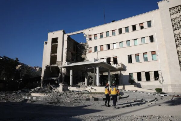 DAMASCUS, SYRIA - JULY 16: Members of Syria's civil defense work amid the aftermath of an Israeli airstrike on Syria's defence ministry headquarters on July 16, 2025 in Damascus, Syria. A spokesperson from the Israeli Defense Forces (IDF) confirmed Wednesday that Israeli airstrikes have targeted the headquarters of Syria's defence ministry and a site near the presidential palace in Damascus. The strikes come amid an escalation in conflict between Syrian government forces and Druze militia in the southern Syrian city of Sweida, or Suwayda. Israel has previously vowed to protect the Druze in Syria, due to the deep brotherly alliance with our Druze citizens in Israel, and their familial and historical ties to the Druze in Syria, according to Israeli Prime Minister Benjamin Netanyahu's office. (Photo by Ali Haj Suleiman/Getty Images)