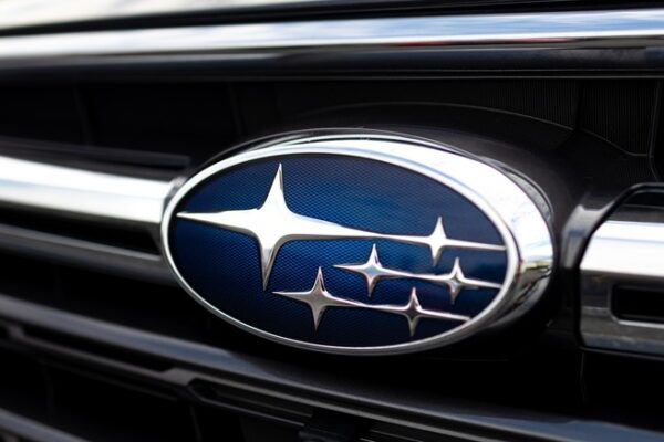 Close-up of Subaru logo on a car grille