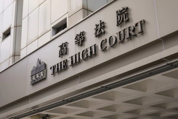 Hong Kong man who claimed to be reincarnated Thai king gets life for axe murder