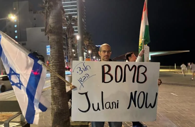 Around 50 protesters gathered outside the US embassy to protest against what they described as Washington's inaction in the face of the latest massacre in Syria carried out by the Sharaa regime, on January 21, 2026. (credit: DANIELLE GREYMAN-KENNARD)