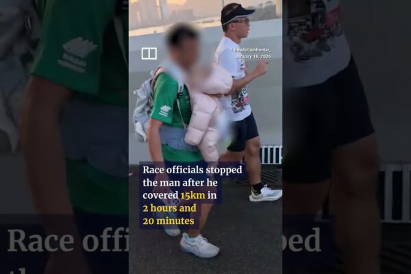 Police probe child abuse report after man runs with baby in Hong Kong Marathon