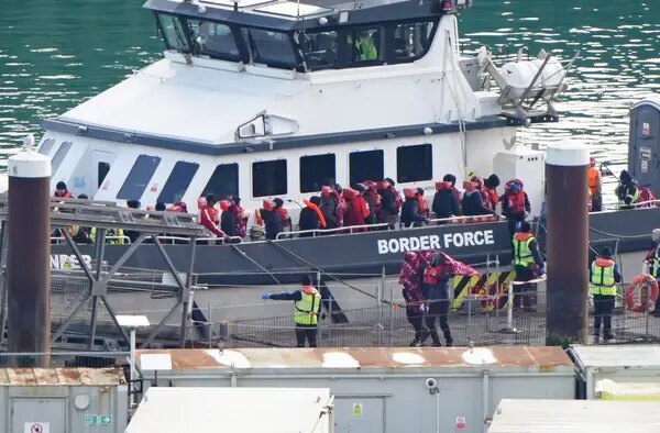 People are taken to the Border Force compound in Dover