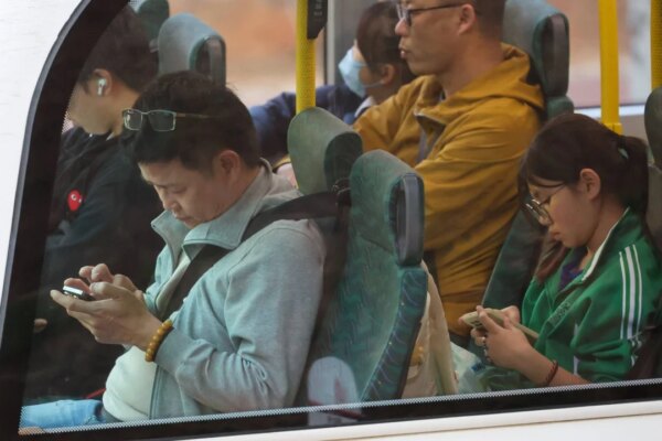 Hong Kong leader urges patience amid pushback against mandatory seat belts on buses
