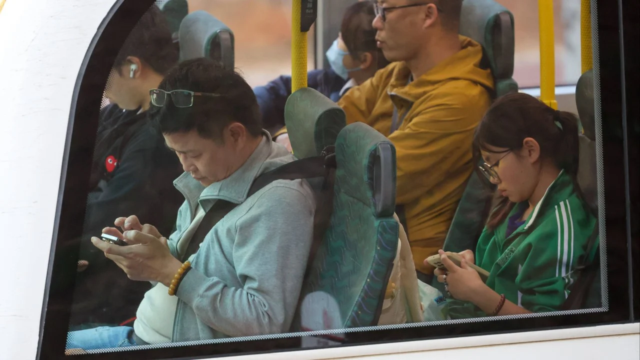 Hong Kong leader urges patience amid pushback against mandatory seat belts on buses