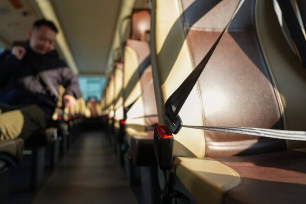 Hong Kong lawmakers urge review of seat belt policy on buses amid complaints