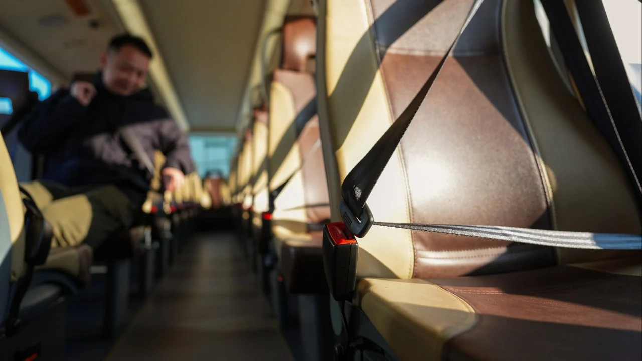 Hong Kong lawmakers urge review of seat belt policy on buses amid complaints