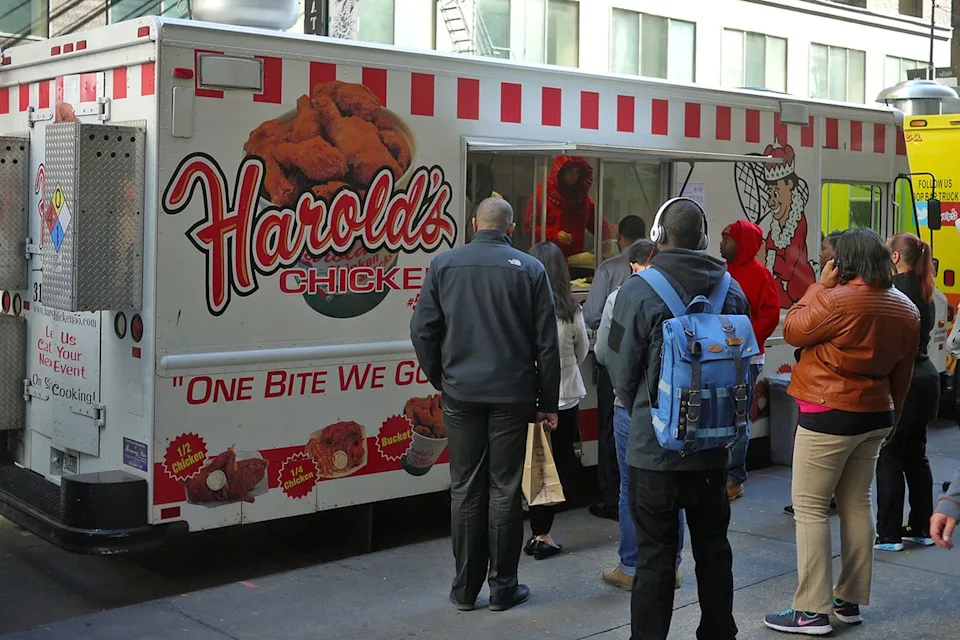 Interim Archives/Getty View of the pedestrians lined up at a Harold's Chicken food truck parked on South Clark Street (between Monroe and Adams streets), Chicago, Illinois, October 2016.