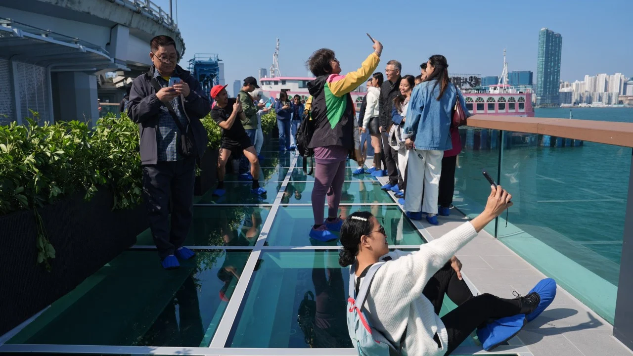 Glass observatory deck along Hong Kong Island promenade draws tens of thousands