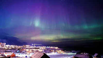 Aurora borealis, also known as the northern lights, is seen in the sky above Nuuk, Greenland, Tuesday, (AP)