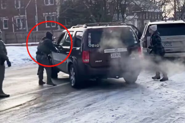 The ICE officer shot the woman as she appeared to be driving away.