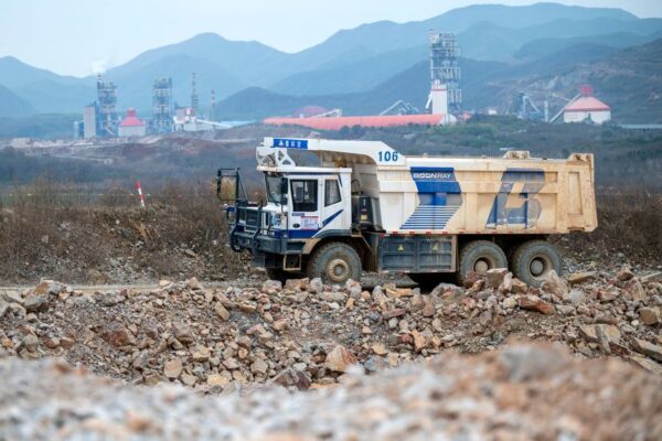 Unmanned electric mining truck operating in the mining area of Huzhou Nanfang Mining Co. on March 14, 2025, in Huzhou, Zhejiang Province of China.
