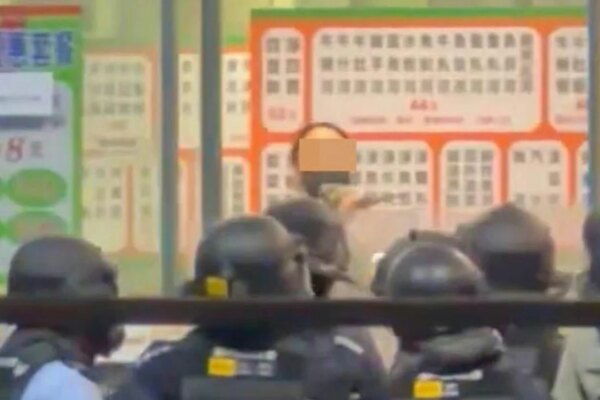 Woman arrested for brandishing cleaver at Hong Kong restaurant staff, police