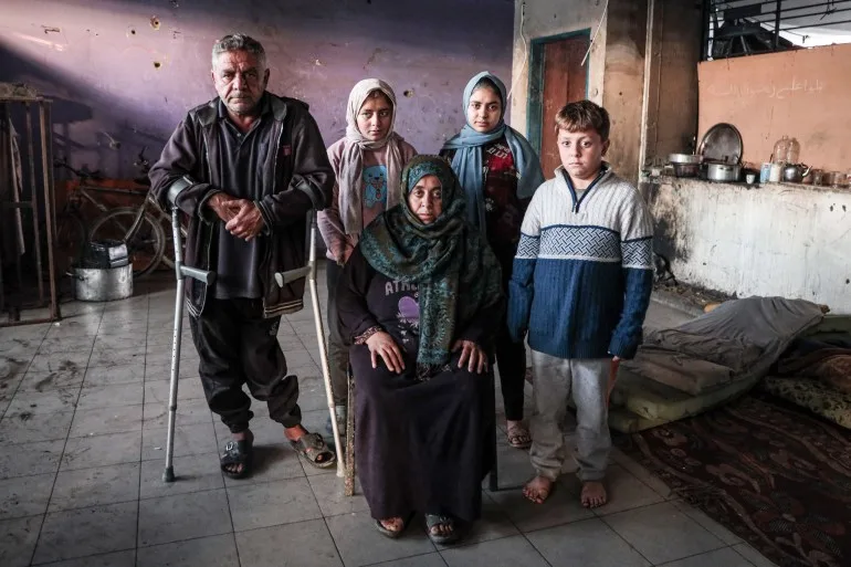 Majed Hamouda’s family, displaced into a school class in Gaza City