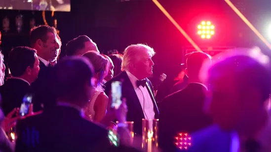 President Trump mingling with guests during a New Year’s Eve event at his Mar-a-Lago home.