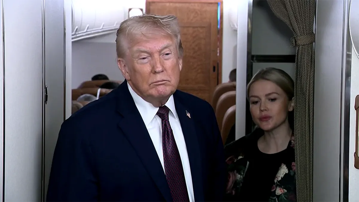 Trump speaks on Air Force One.