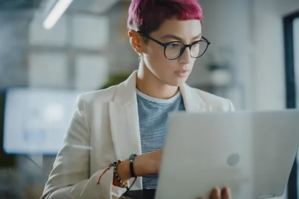 A person at a laptop.