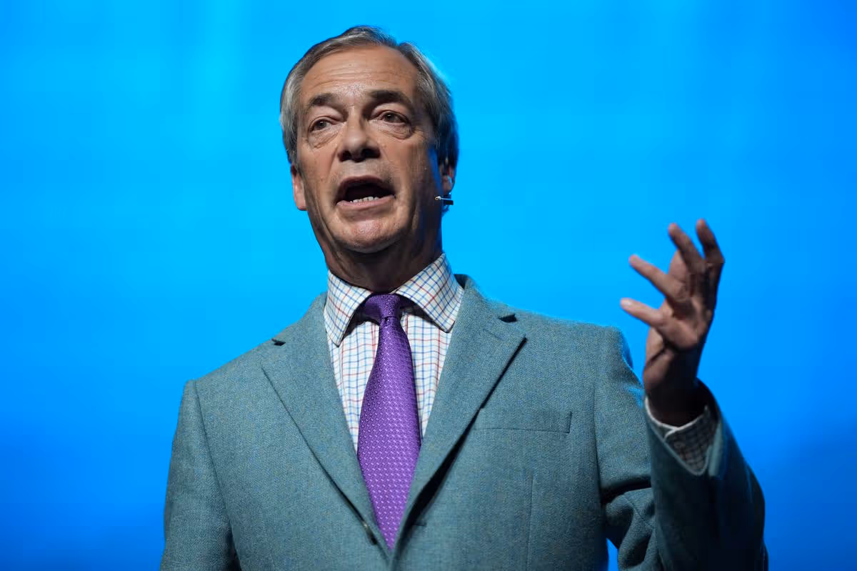 LLANDUDNO, WALES - NOVEMBER 24: Reform UK Leader Nigel Farage attends a rally at Venue Cymru, on November 24, 2025 in Llandudno, Wales. The rally comes days after Nathan Gill, former leader of The Reform Party in Wales and Member of European Parliament (MEP) for UKIP, was sentenced to ten-and-a-half years in prison on bribery charges for accepting payment in return for making pro-Russian statements.  (Photo by Christopher Furlong/Getty Images)