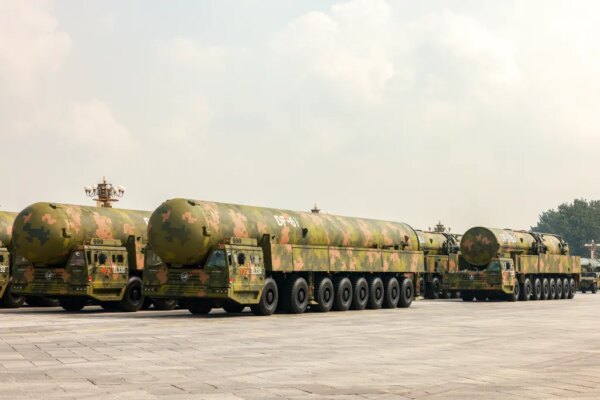 DF-61 intercontinental ballistic missiles on military transport vehicles.