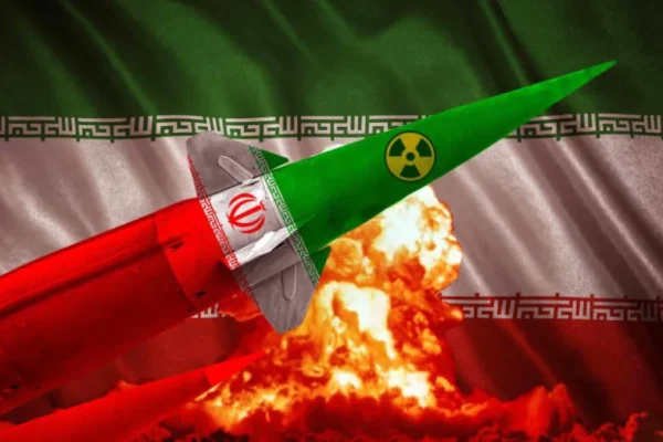 An illustration of an Iranian ballistic missile in front of a backdrop of a mushroom explosion cloud and the Iranian flag. (credit: BERK CAN/Shutterstock)