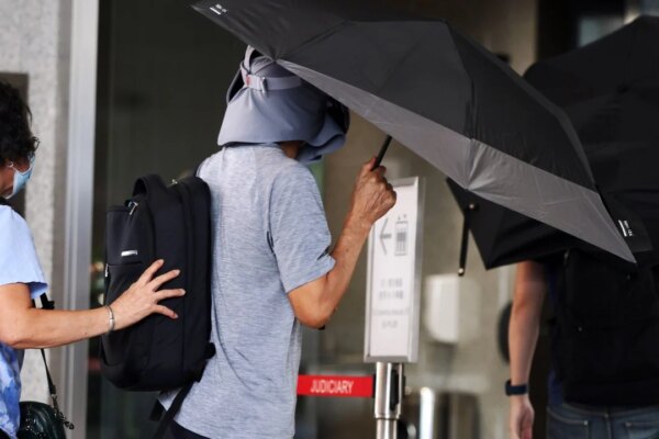 Hong Kong fugitive’s father jailed for trying to cash out her insurance policy