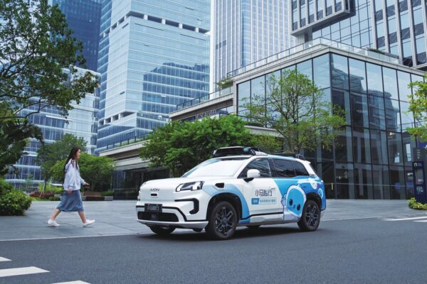 A passenger walks to a Pony.ai robotaxi in Shenzhen, South China's Guangdong Province, during the 2026 Spring Festival holiday. Photo: Courtesy of Pony.ai