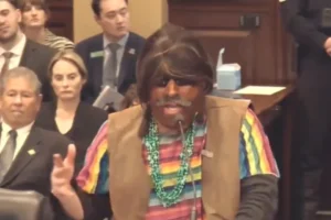 David Pettinger addresses the Idaho House Business Committee in an offensive costume on Monday February 23, 2026 (Idaho Public Television)
