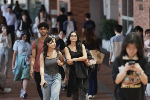 How many non-local students are going to Hong Kong universities since quota rise?