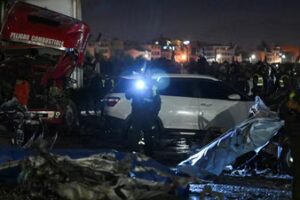 Emergency personnel work at the site where a Bolivian Air Force Hercules aircraft crashed on Friday evening onto a busy avenue amid inclement weather in the city of El Alto, Bolivia, February 27, 2026. (REUTERS)
