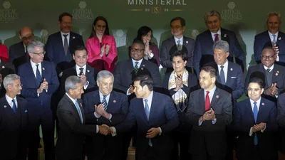 US Secretary of State Marco Rubio (C) shakes hands after posing for a "family photo" with the 55 government officials, including EAM S Jaishankar. (Getty Images via AFP)