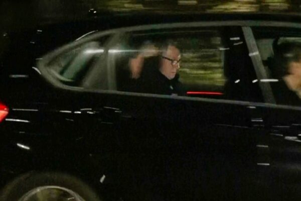 In this photo taken from video by Sky News, Britain's former ambassador to the U.S. Peter Mandelson is seen in a vehicle leaving a police station in London in the early hours of Tuesday, Feb. 24, 2026. (Sky News Exclusive via AP)