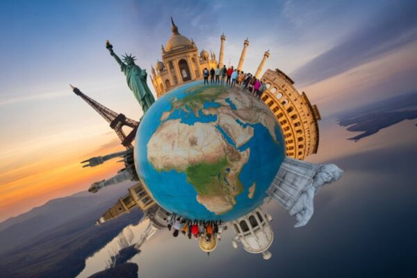 A dynamic, high-energy composite image of global tourism, featuring iconic landmarks like the eiffel tower, statue of liberty, great wall of china, colosseum, and the taj mahal, all blending seamlessly into a globe, with vibrant colors, dynamic lighting, and travelers from diverse backgrounds captured in action, with the world’s most recognizable landmarks shining brightly.