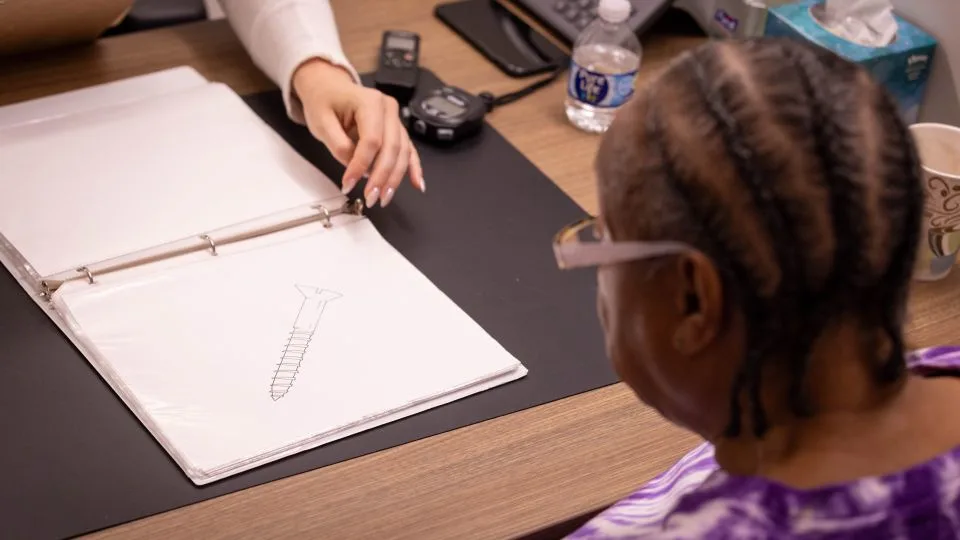 A SuperAger takes a cognitive test in the lab. - From Shane Collins/Northwestern University