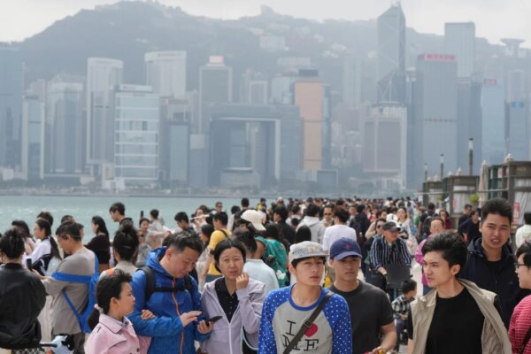 Hong Kong visitor numbers jump for Chinese New Year holiday as gold sales shine