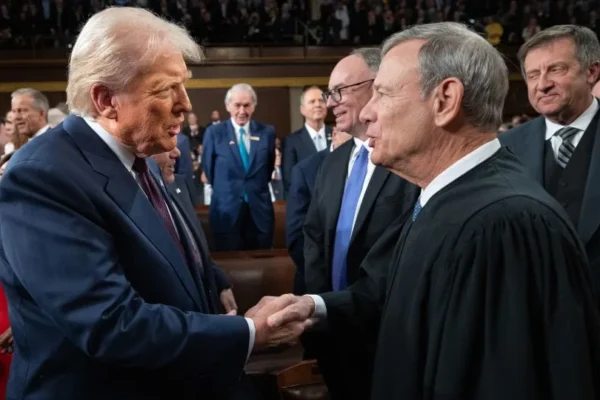 President Donald Trump greets Chief Justice of the United States John G. Roberts, Jr as he arrives to deliver an address to a joint session of Congress at the U.S. Capitol on March 04, 2025 in Washington, DC. - Win McNamee/Getty Images