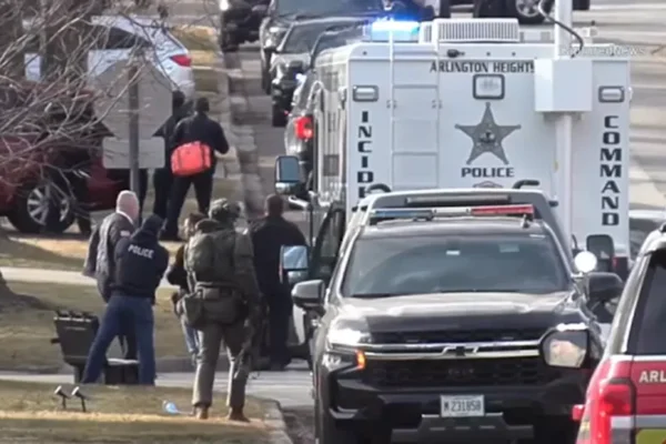 Armed home invasion suspect in custody after hours-long stand off in Arlington Heights, 2 rescued