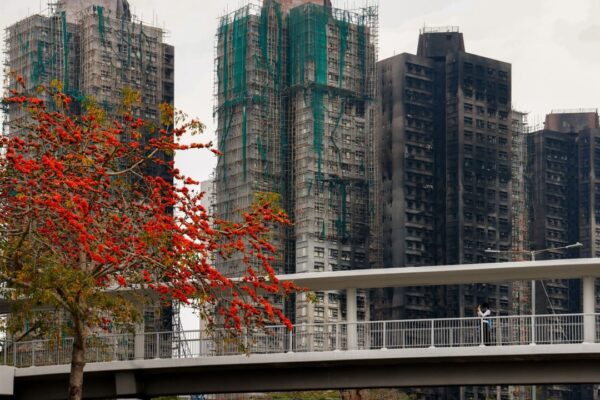 Hong Kong official warns of lower payout if Tai Po fire victims reject buy-back plan