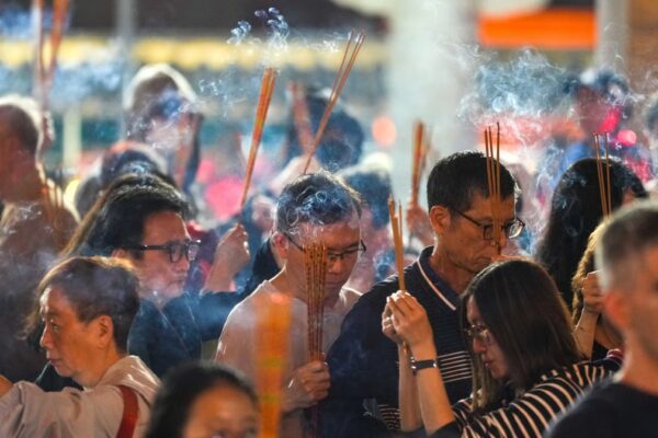 Crowd control measures are strictly enforced, with a one-way flow of worshippers. Photo: Sam Tsang