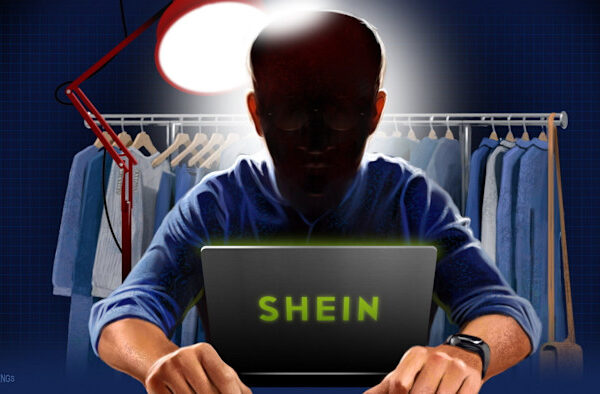 Illustration of Person in the News Xu Yangitan sitting in front of a rack of clothing with his laptop in front of him. His face is dark as a lamp behind his back is illuminating the screen of his laptop.