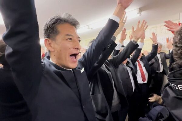 Supporters of Takaichi's LDP cheer as the election results are announced