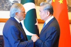 China’s Foreign Minister Wang Yi (right) receives Deputy Prime Minister and Foreign Minister Ishaq Dar upon arrival at the Diaoyutai State Guest House in Beijing, China, March 31, 2026. — X/@ForeignOfficePk