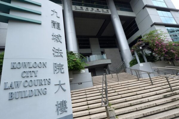 Hong Kong mum charged with abuse after son, 12, calls police over cane beating