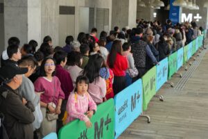 Visitors queue as the M+ Museum in the West Kowloon Cultural District prepares to open its doors on March 9. To celebrate Art March Hong Kong, M+ is offering free admission to its general admission exhibitions. Photo: May Tse