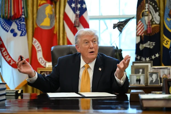 US President Donald Trump speaks while signing an executive order on fraud in the Oval Office at the White House in Washington, DC, on March 16, 2026. (Photo by ANNABELLE GORDON / AFP via Getty Images)