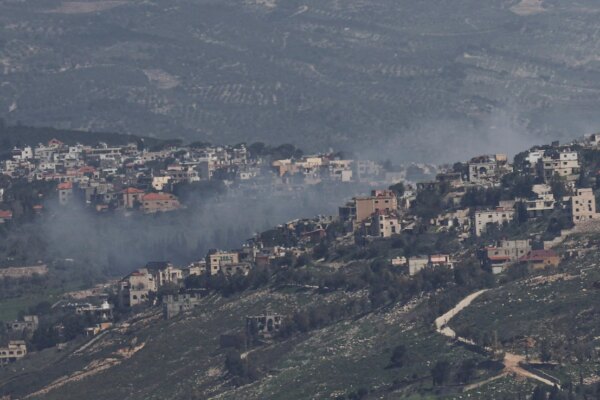Smoke rises from a Lebanese village near the border with Israel on March 19, 2026
