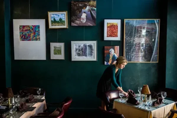 Staff at Vera Mae's Bistro prepares the restaurant for its dinner opening in 2021.